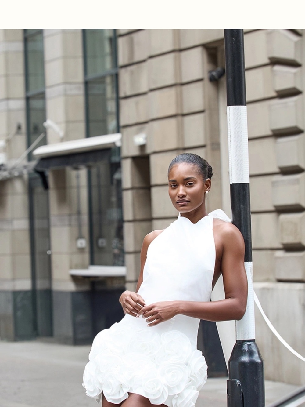 PrettyLittleThing White Halter Mini Dress with Rosette Hem
